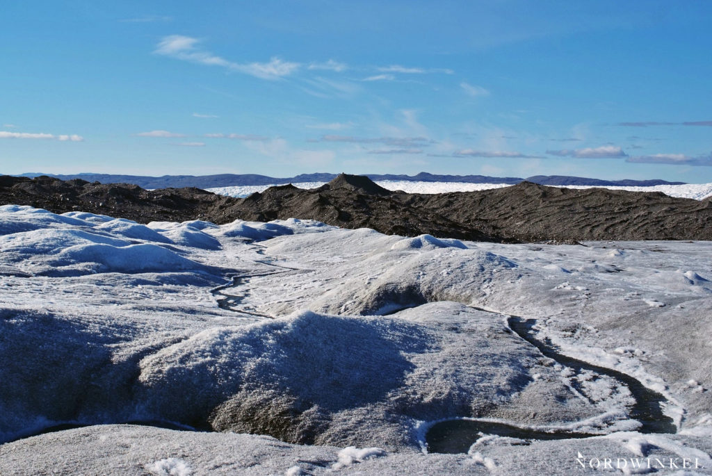 ausläufer inlandseis vor geröllmoräne eines gletschers